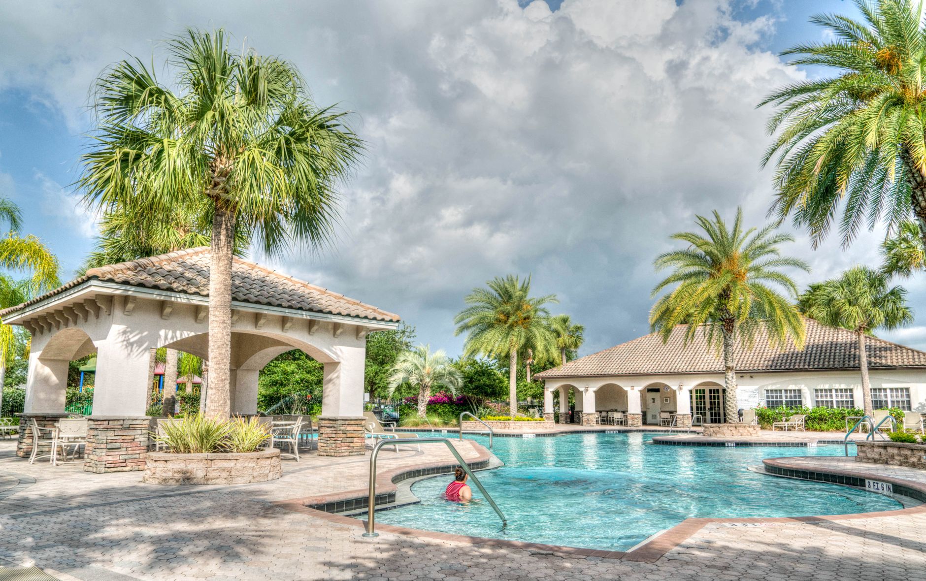 A crystal-clear pool serviced by AAA Florida Pool Service